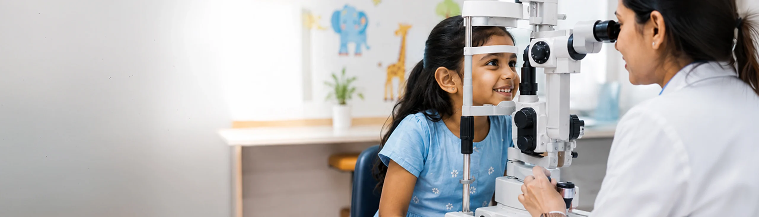 Doctor interacting with child patient